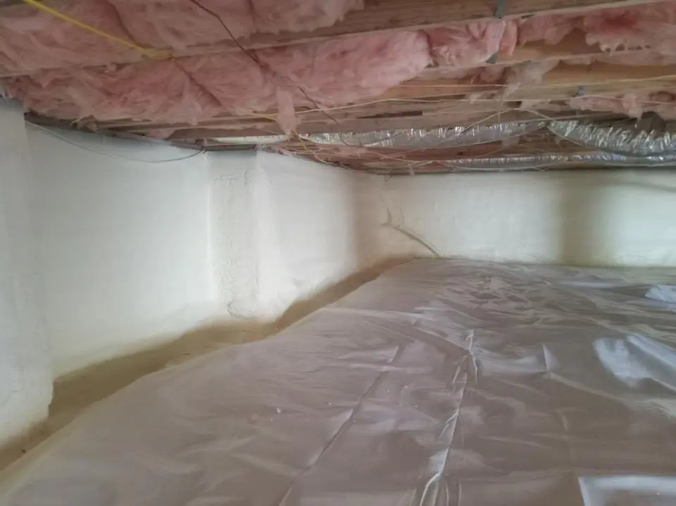 Crawl space encapsulation with closed-cell spray foam for Commercial Roof Restoration in Hallsville